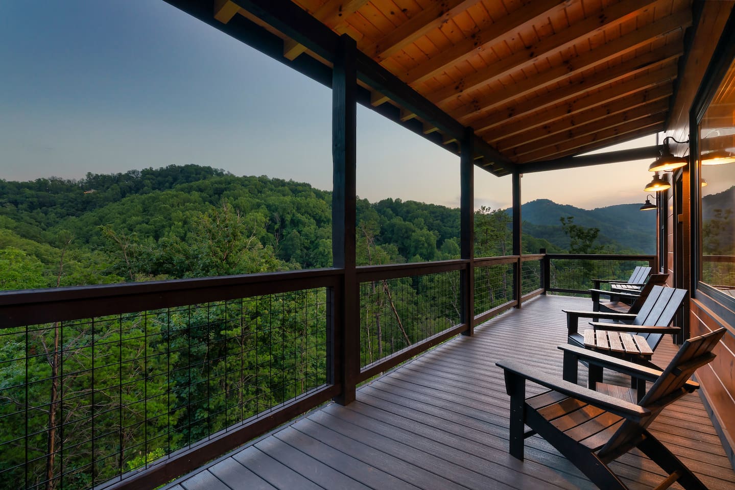 Covered deck chairs overlooking Wears Valley mountain views